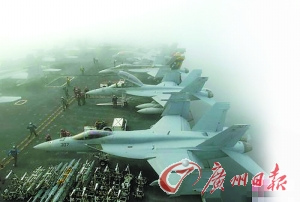 參加韓美聯(lián)合軍演的美軍航母及艦載機(jī)。　　圖/中新